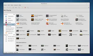 Confirmado Rhythmbox como reproductor predeterminado U 12.04