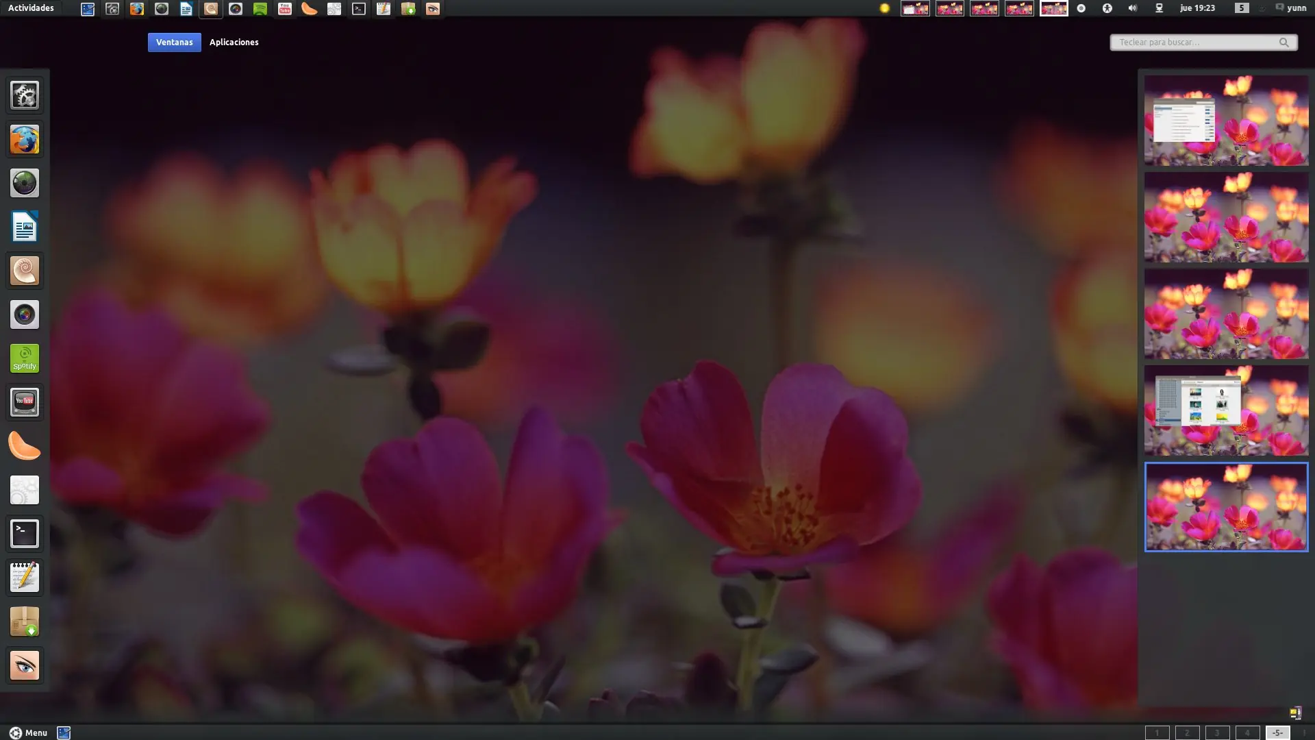 Gnome 3.2 en Oneiric y Precise – Extension Cambiador de Es
