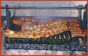 Como hacer un cabrito a la parrila y lechoncito al asador