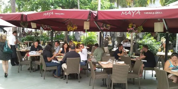 Pagar la comida en Pesos en Miami