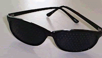 Mejorar miopía: gafas reticulares.