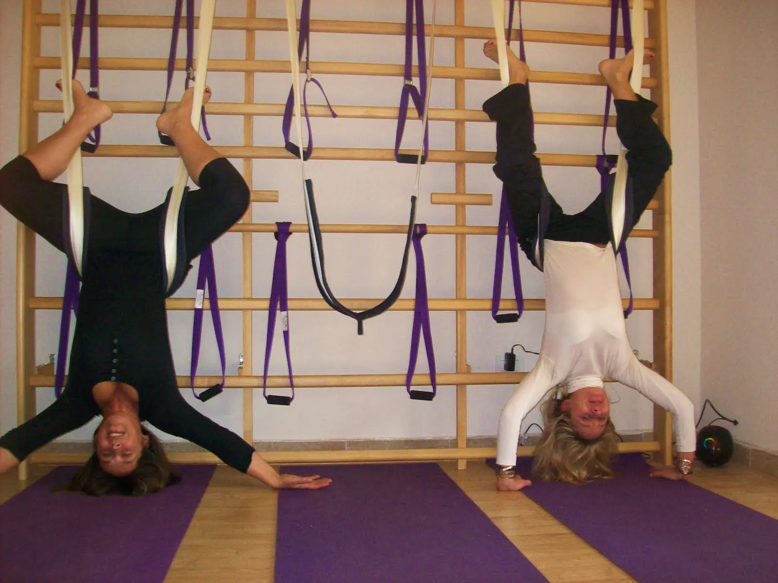 Yoga Posturas invertidas con columpios