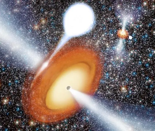 Dos agujeros negros en un cúmulo de estrellas,