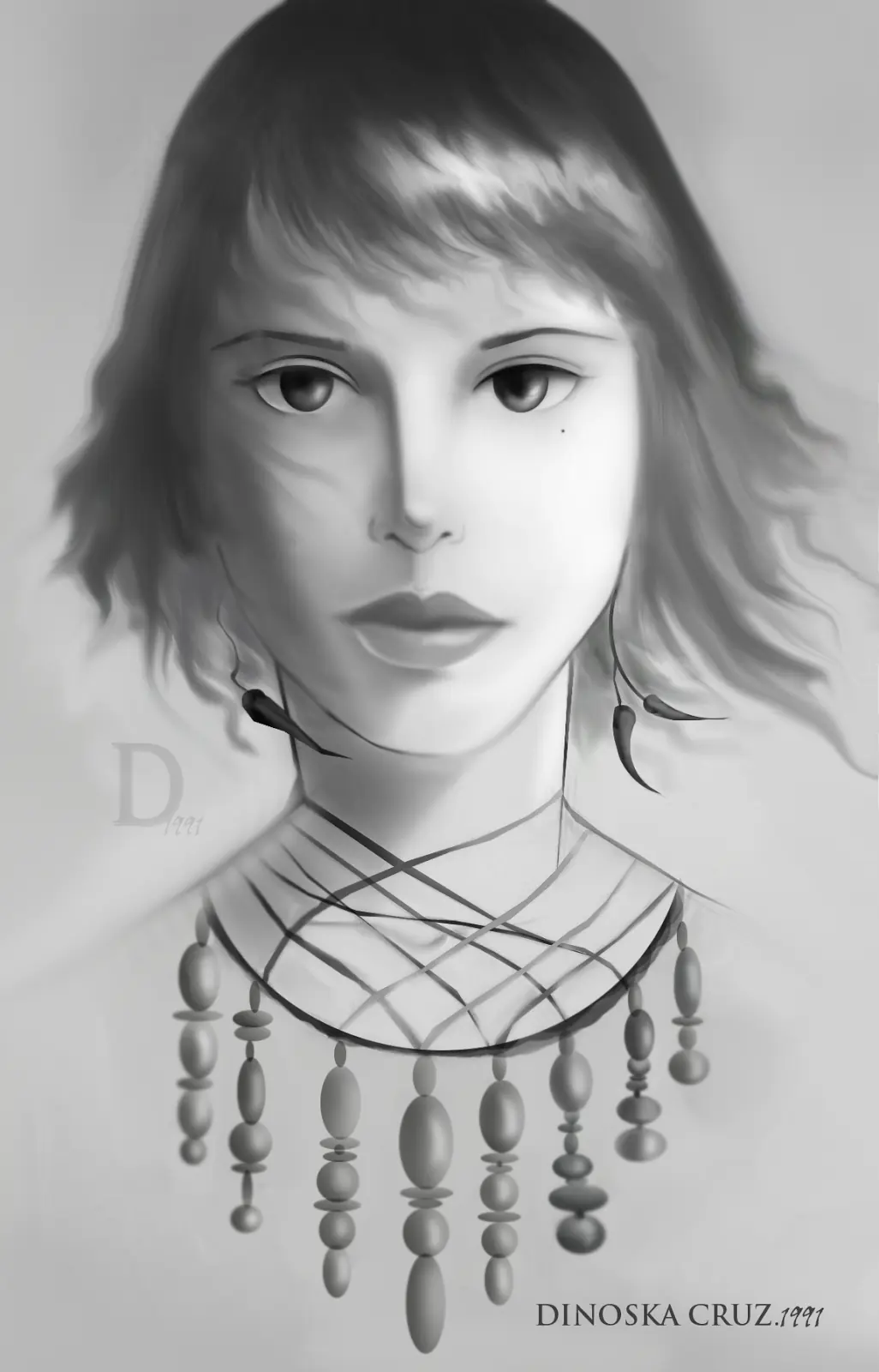 Dibujos acromáticos: Rostros femeninos.