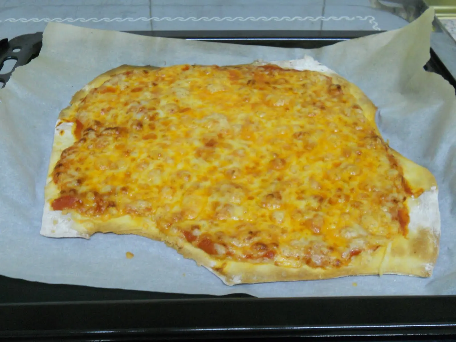 Gran pizza a los 4 quesos...