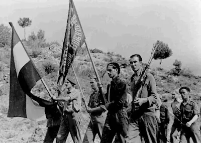 española