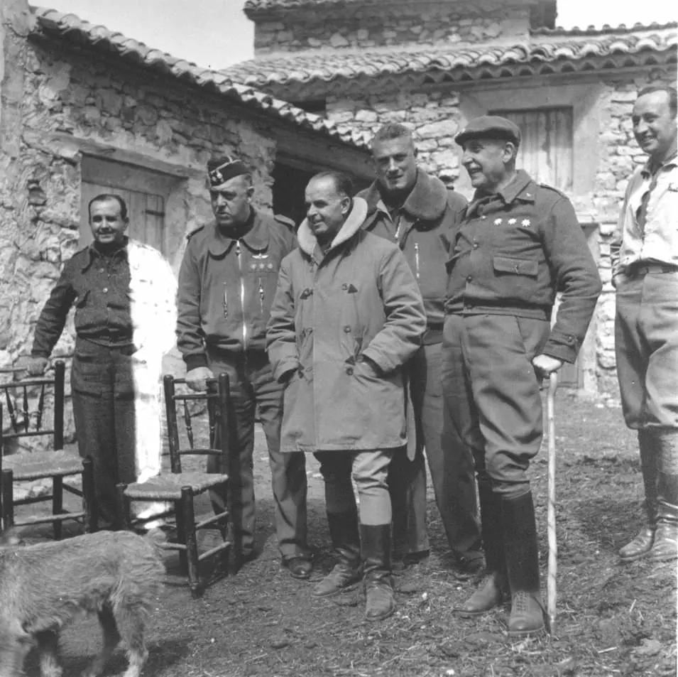 española