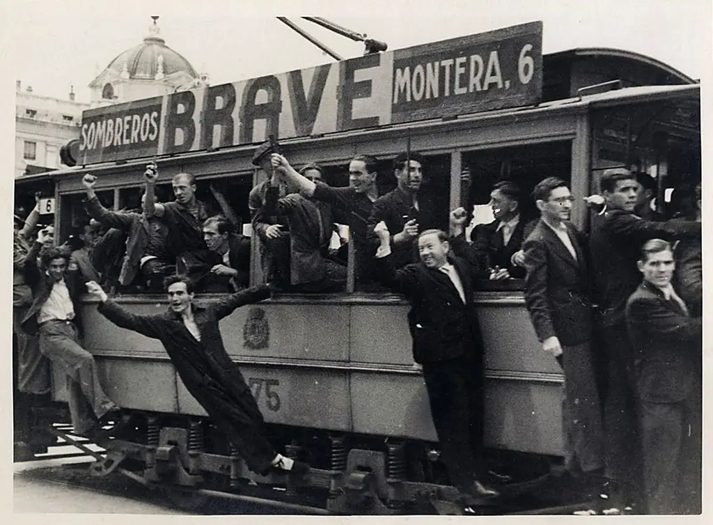 española