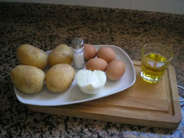 española