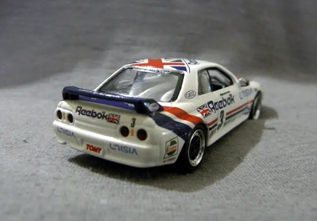 autos a escala 1/64