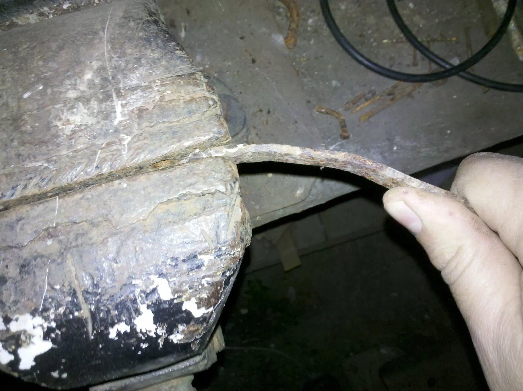 con varilla de hierro