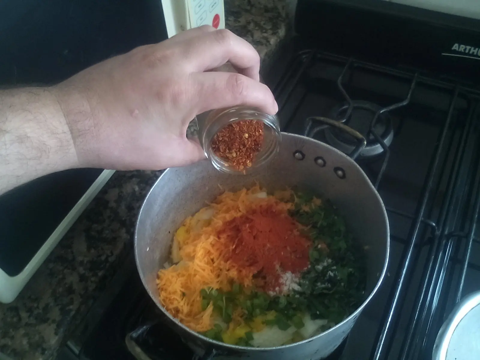 Guiso de arroz con menudo de pollo