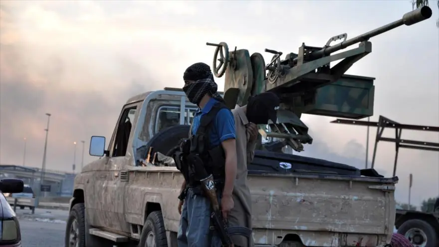 Terroristas en Damasco entregan armas pesados