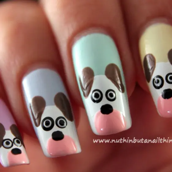 Pinta un adorable perro en tus uñas.