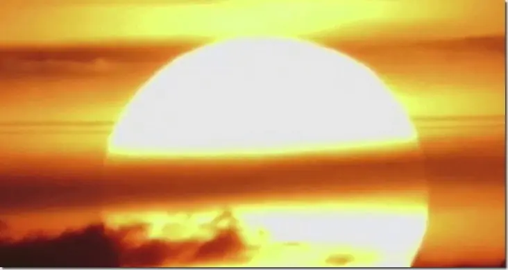 Efecto óptico: nubes detrás del sol