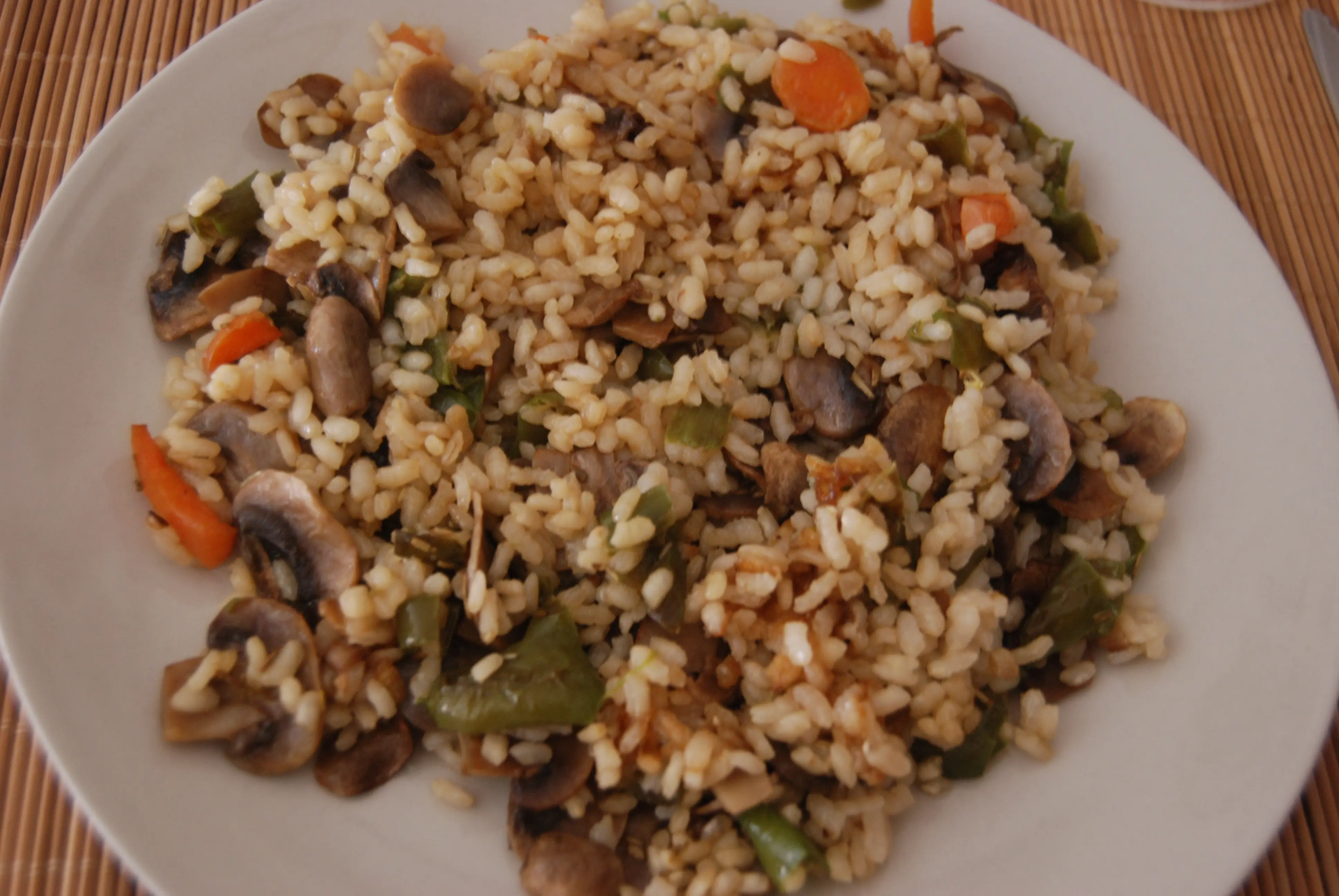 Cómo preparar arroz con champiñones