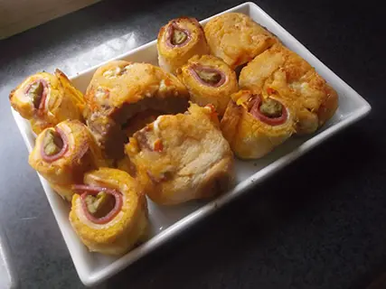 Rollitos de hamburguesa y jamon con esparragos Rollitos de hamburguesa y jamon con esparragos