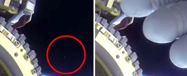 Astronauta oculta con su mano la presencia de ovnis pasando