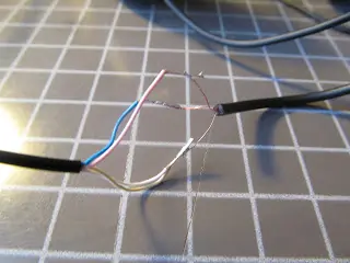 como reparar tus audifonos