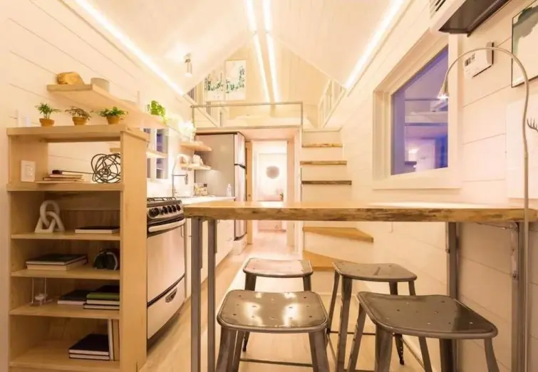 Esta pequeña casa cuenta con sólo 30 m2 tiene un invernadero