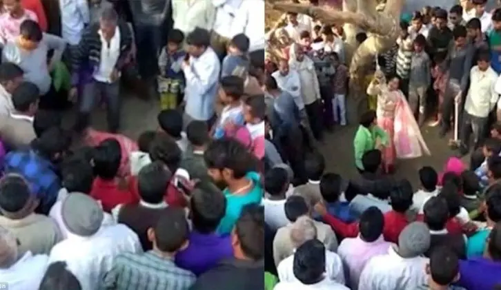 Azoto a su esposa y la muchedumbre la abuso